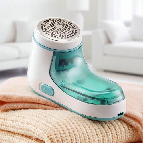 Машинка для удаления катышков STL LR-M01 удаляет катышки с одежды.