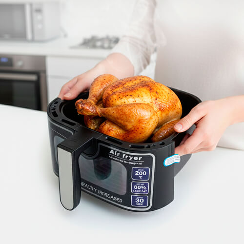 Чаша от аэрогриля STL KB-8002A с запеченной курицей.